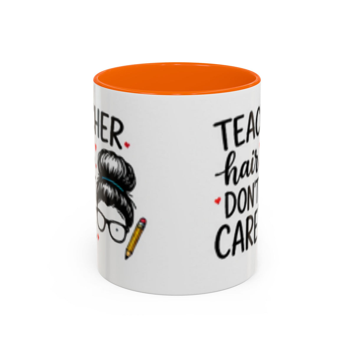 White coffee mug with orange interior rim and “Teacher hair don’t care” text print.