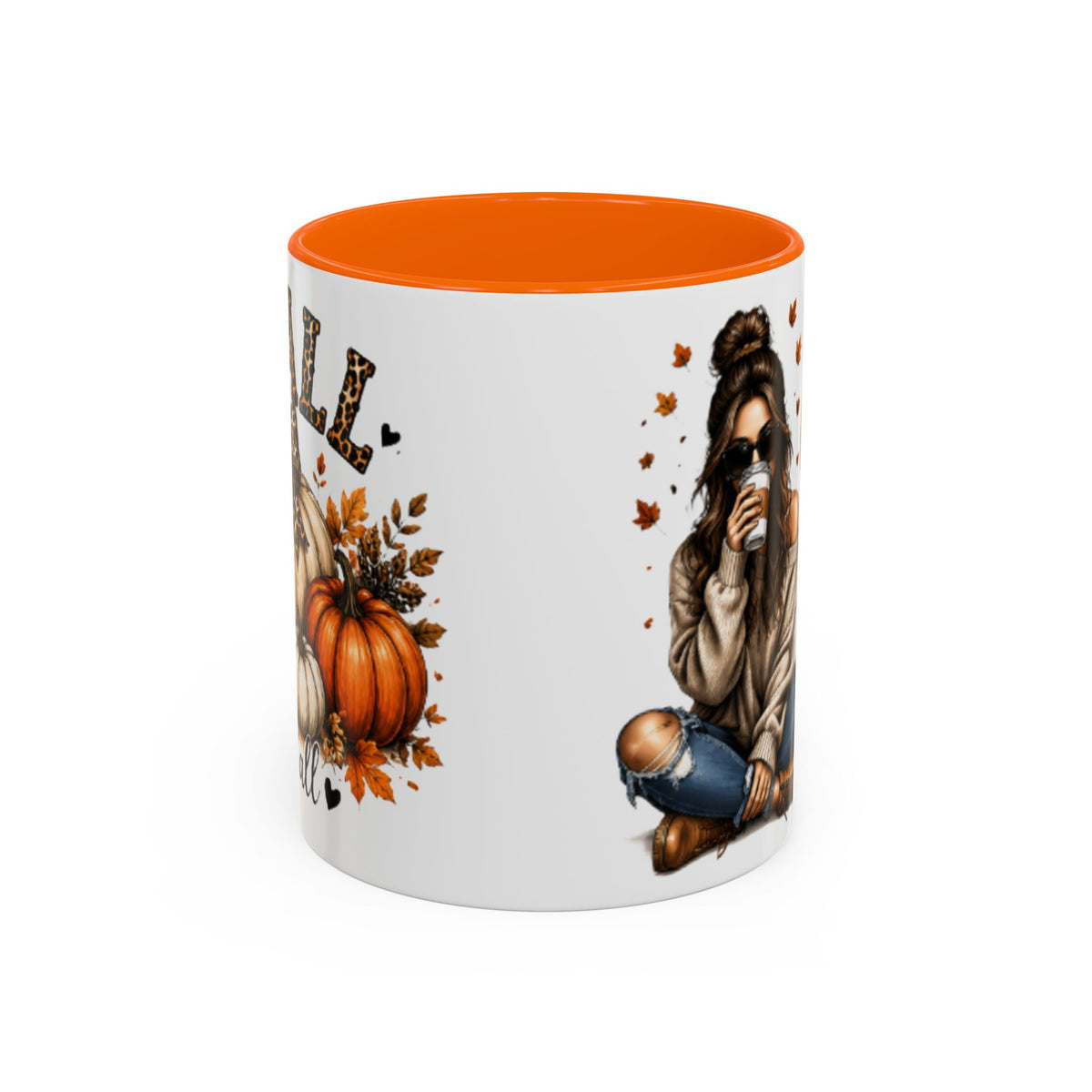 White autumn coffee mug with orange interior rim and fall woman and pumpkin graphic.