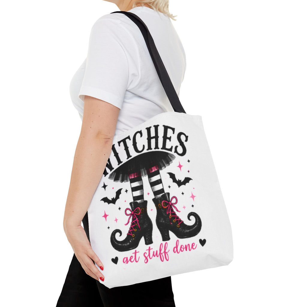 White canvas tote bag with black handles and witch boots graphic, 'get stuff done' text.