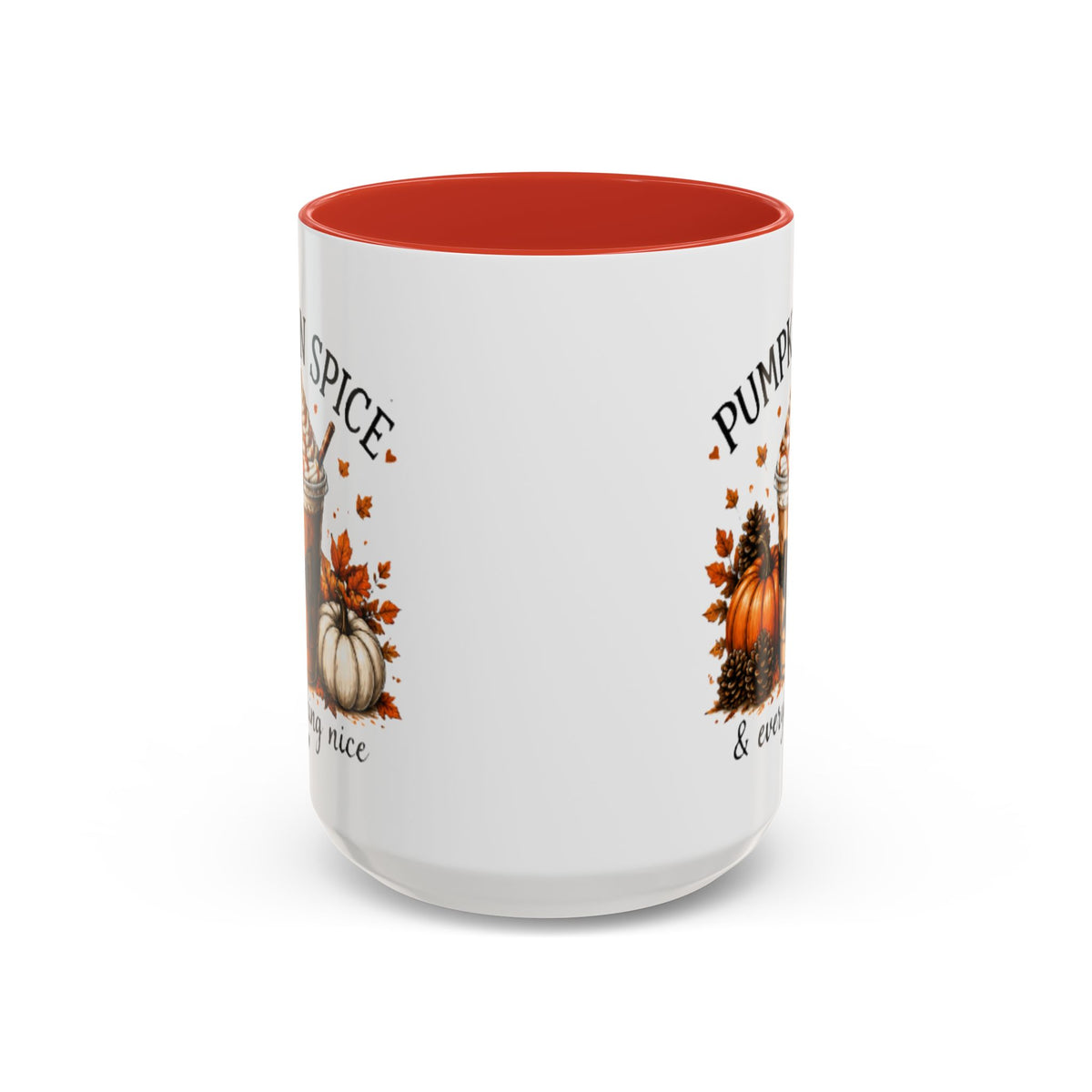 White pumpkin spice coffee mug with orange interior and fall pumpkin graphic with partial text