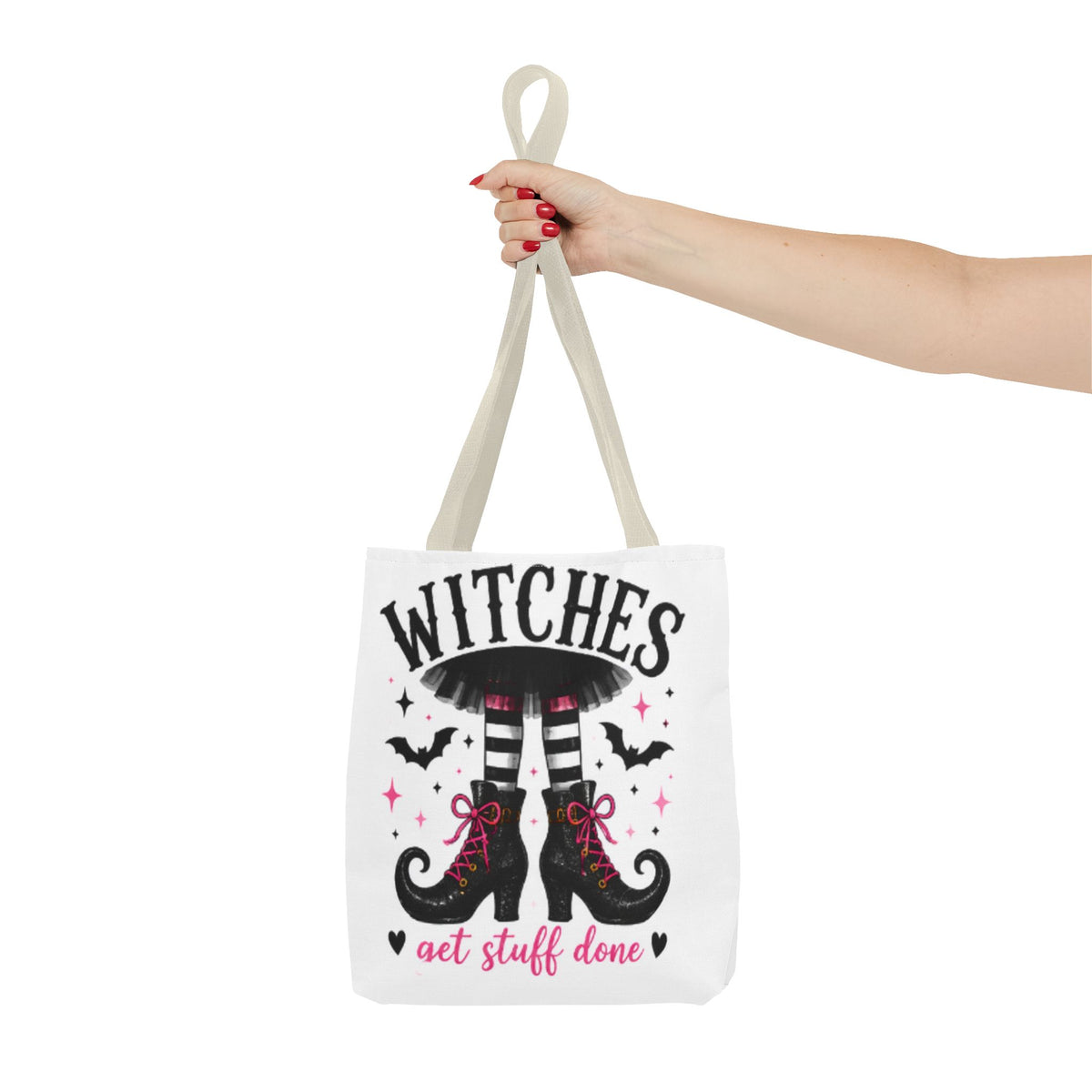 Cream canvas tote bag held up by handle, featuring witch legs and 'get stuff done'