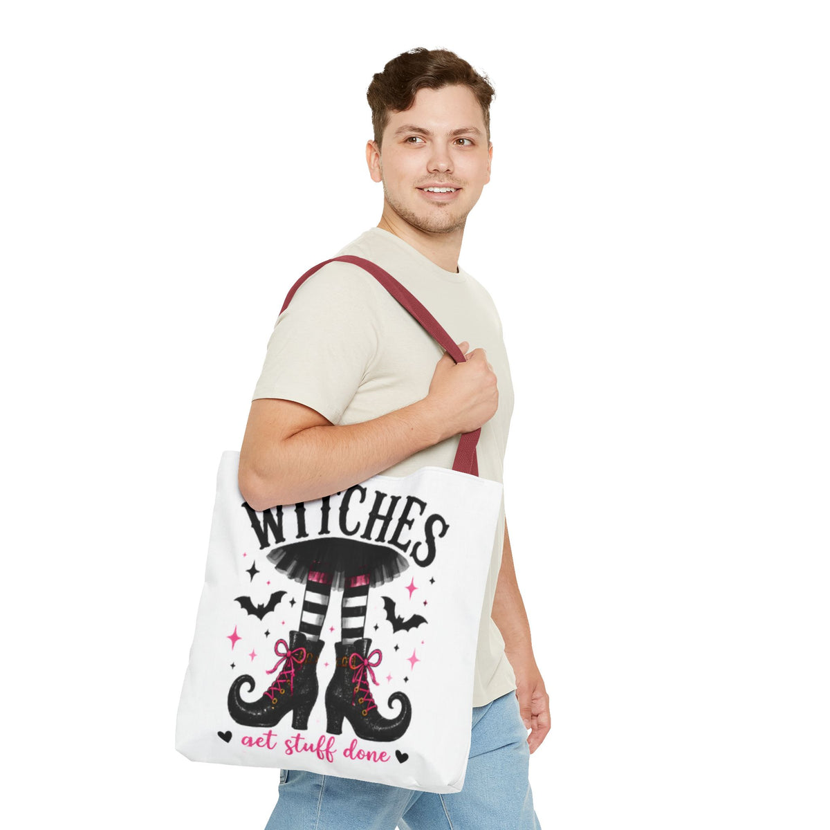 White tote bag with maroon handles, 'WITCHES' boots graphic and bats illustration