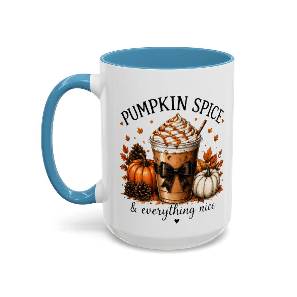 White coffee mug with light blue handle and Pumpkin Spice text over pumpkin-themed art.