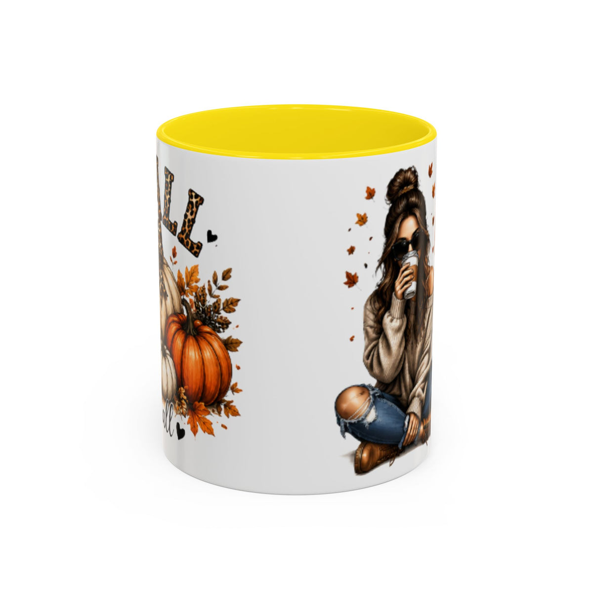 White autumn coffee mug with yellow interior rim and fall woman and pumpkin graphic.