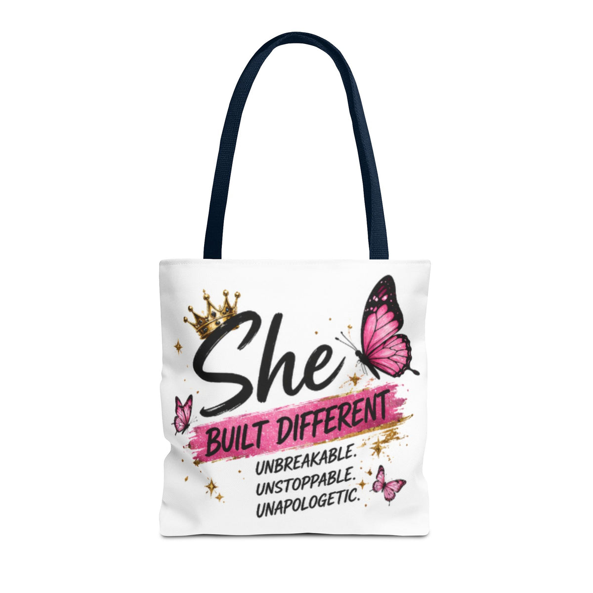 White tote bag with long navy handles, crown and butterfly “She Built Different” front design