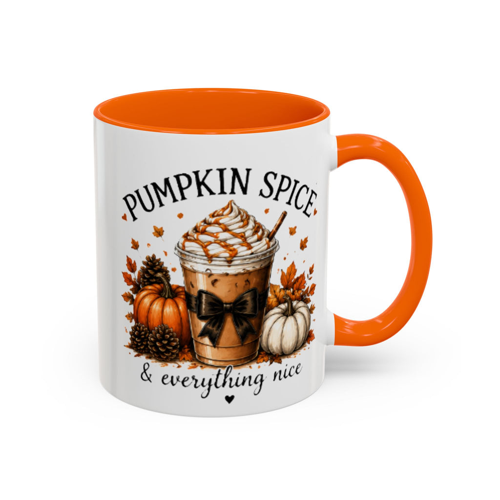 Orange handle and rim white coffee mug featuring Pumpkin Spice and “everything nice”.