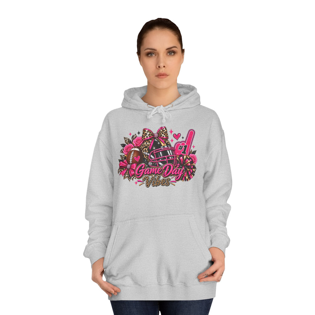 Game Day Cheer Hoodie — Pink Football Floral Design by Printify, light gray hoodie with pink and black football cheer graphic modeled by a woman