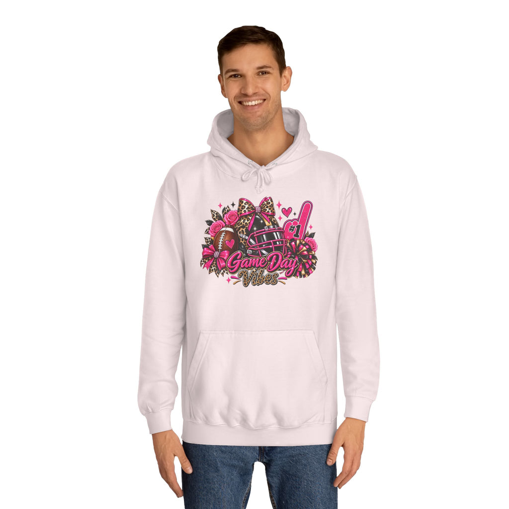 Printify Game Day Cheer Hoodie — Pink Football Floral Design, modeled in a light pink hoodie with a colorful football, flowers, and Game Day graphic