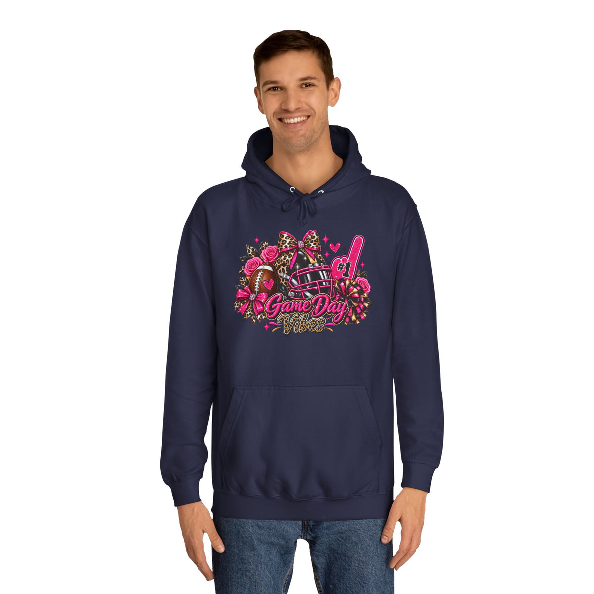 Game Day Cheer Hoodie — Pink Football Floral Design by Printify, modeled by a man in a navy hoodie with a bright pink floral football and cheer graphic
