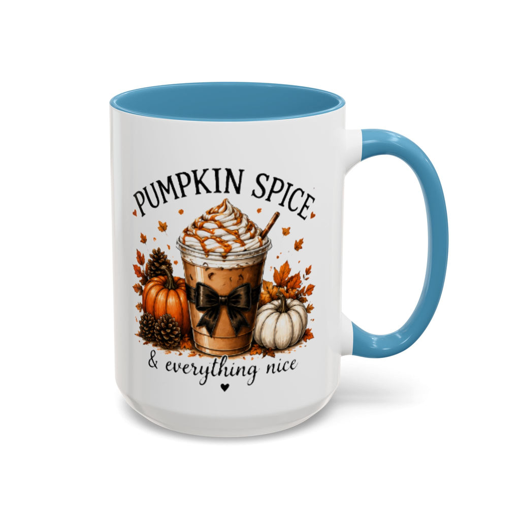 White coffee mug with light blue handle and rim; Pumpkin Spice drink graphic with bow.