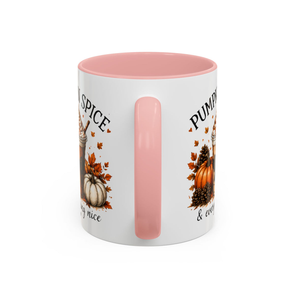 White coffee mug with pink interior; partial “Pumpkin Spice” text and pumpkin graphics