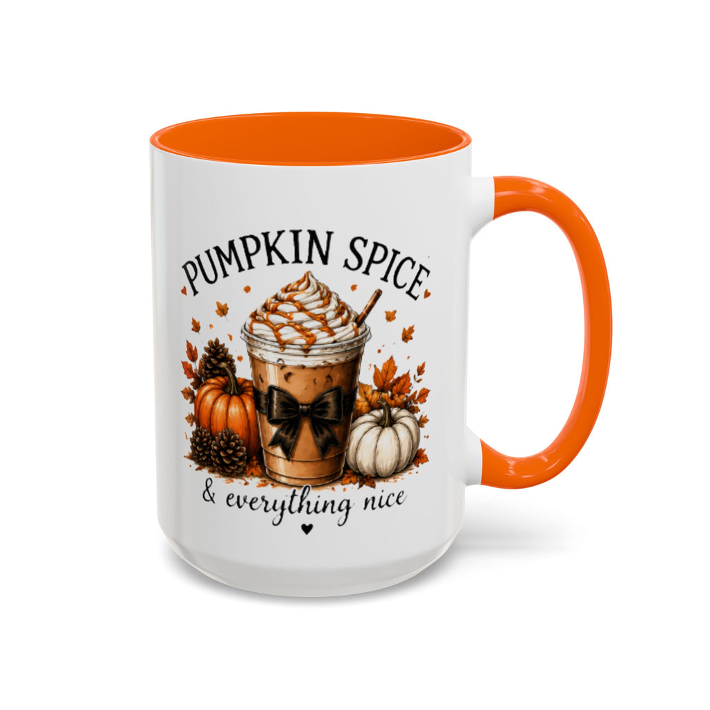 White coffee mug with orange rim and handle, “PUMPKIN SPICE & everything nice” graphic.