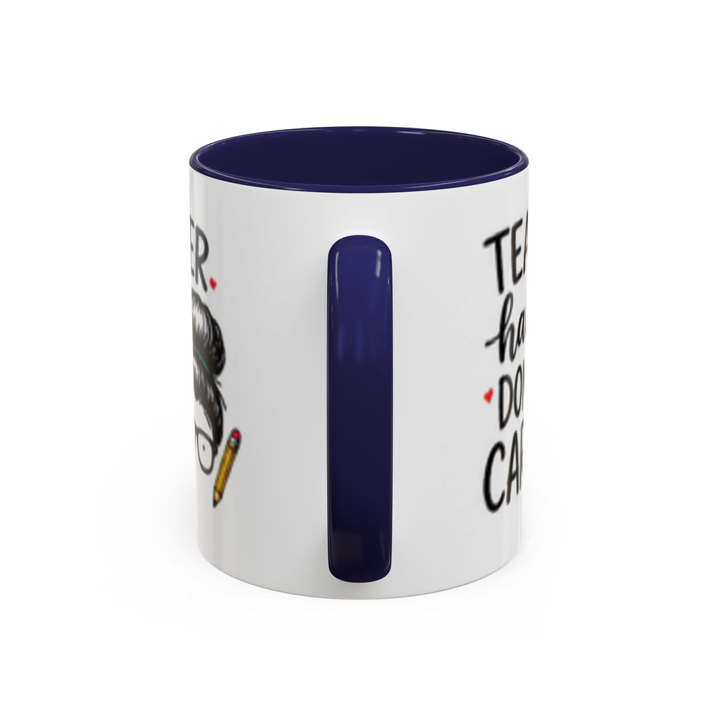 White coffee mug with partial “Teacher hair don’t care” design and navy rim