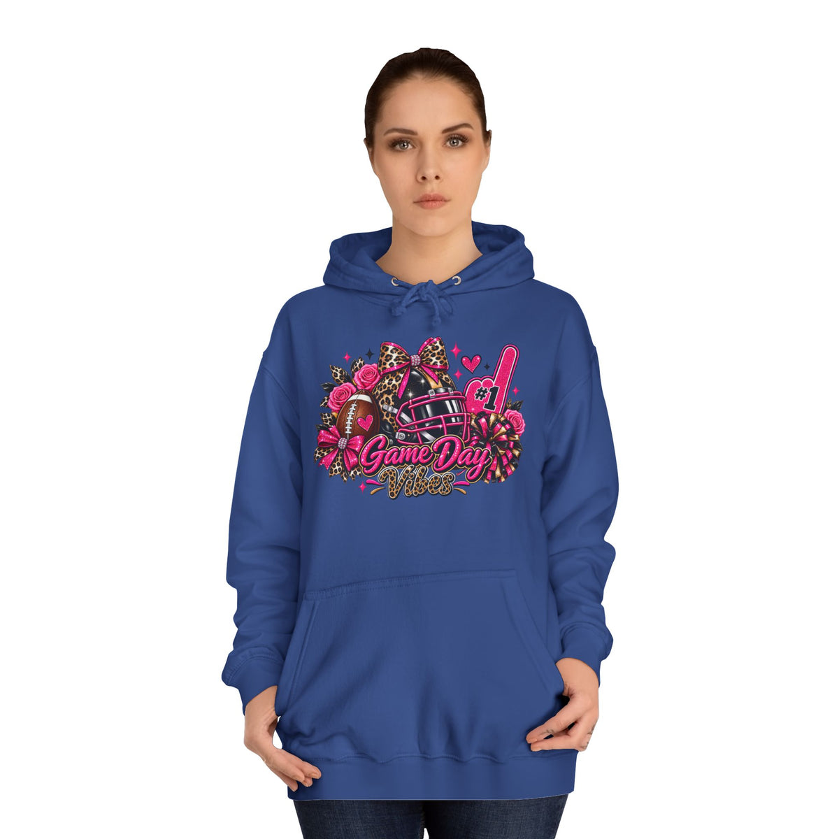 Game Day Cheer Hoodie — Pink Football Floral Design by Printify, modeled in blue with a colorful cheer graphic featuring a football, helmet, and pom poms