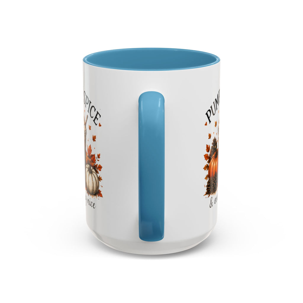 Light blue rim and vertical handle on a white coffee mug with pumpkin design.