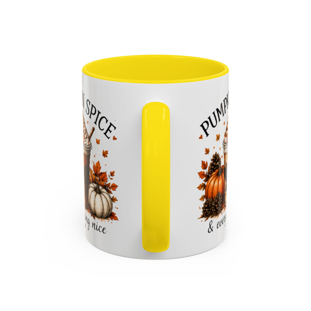 White coffee mug with yellow vertical handle accent and partial “PUMPKIN SPICE” text.