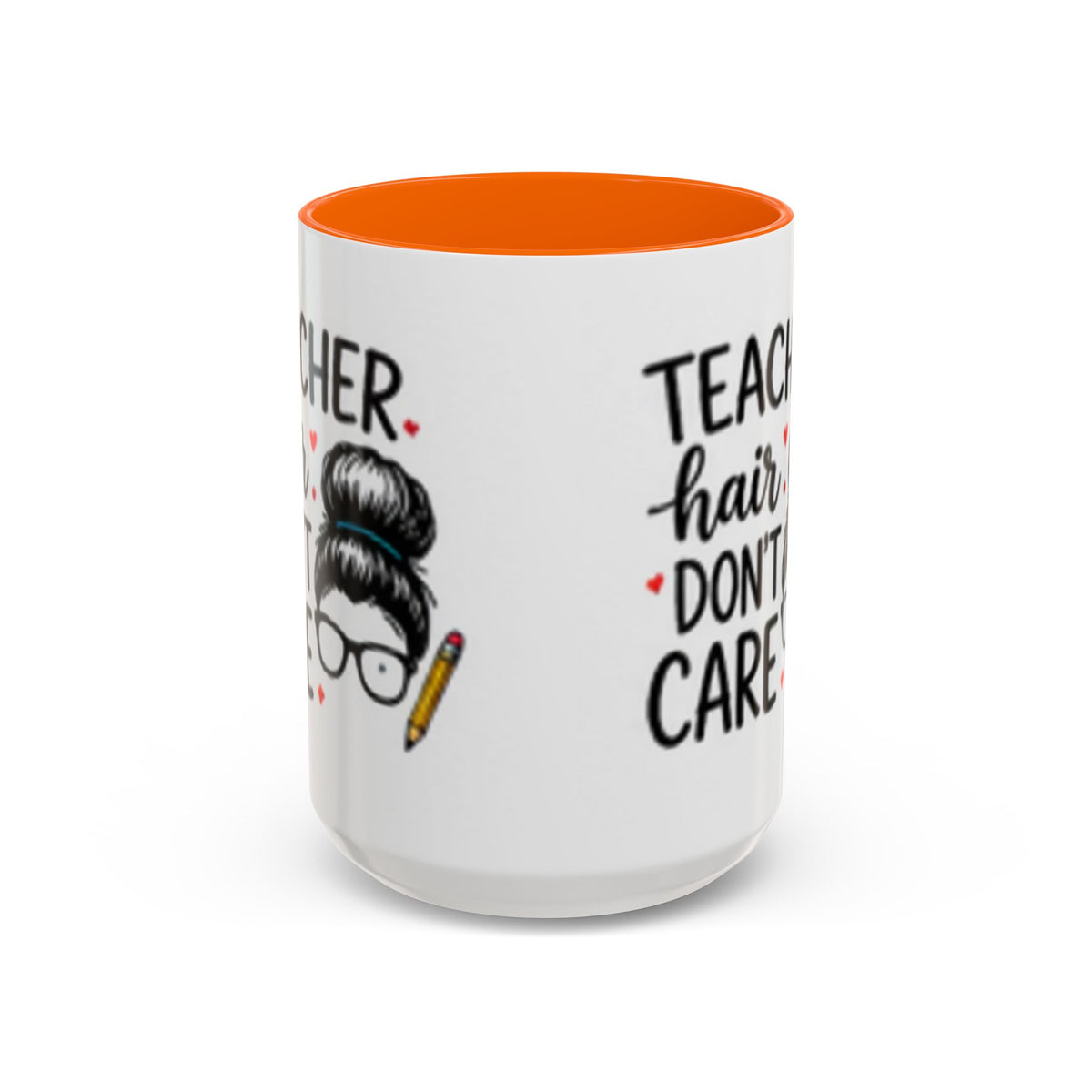White coffee mug with orange interior rim and “Teacher hair don’t care” text and hair graphic.