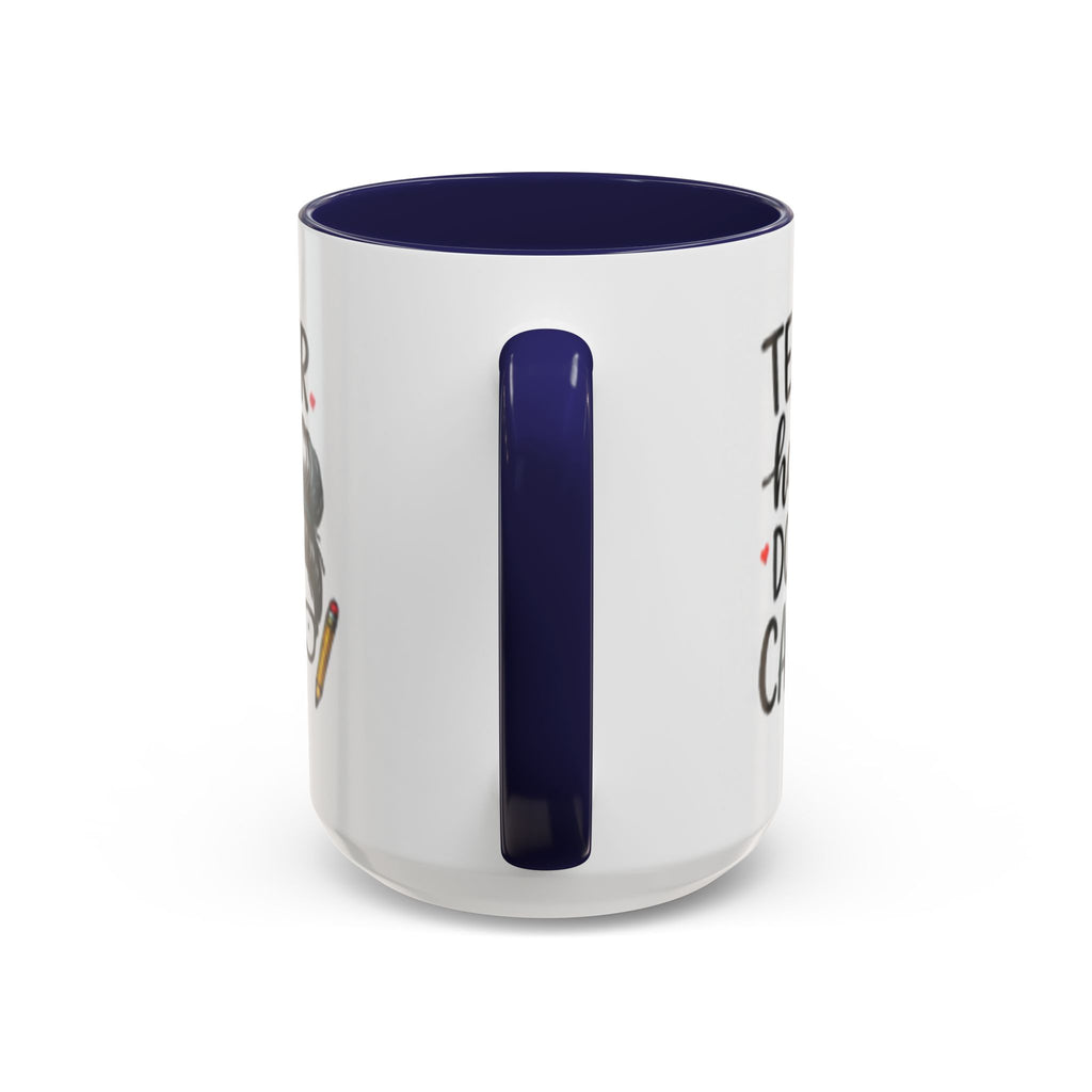 Coffee mug with navy handle and interior, featuring partial “Teacher hair don’t care” text.