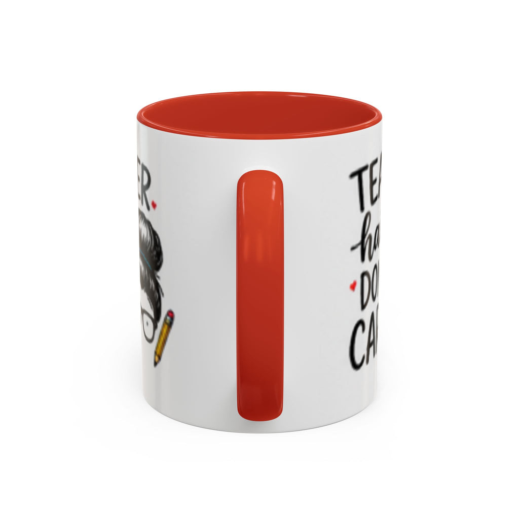 White coffee mug with orange rim and partial “Teacher hair don’t care” design