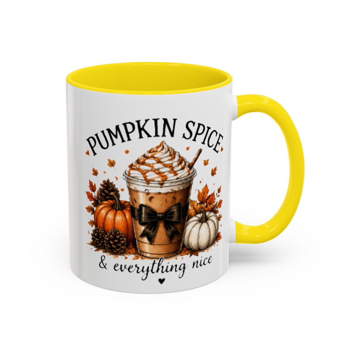 White coffee mug with yellow rim and handle, “PUMPKIN SPICE & everything nice” graphic.