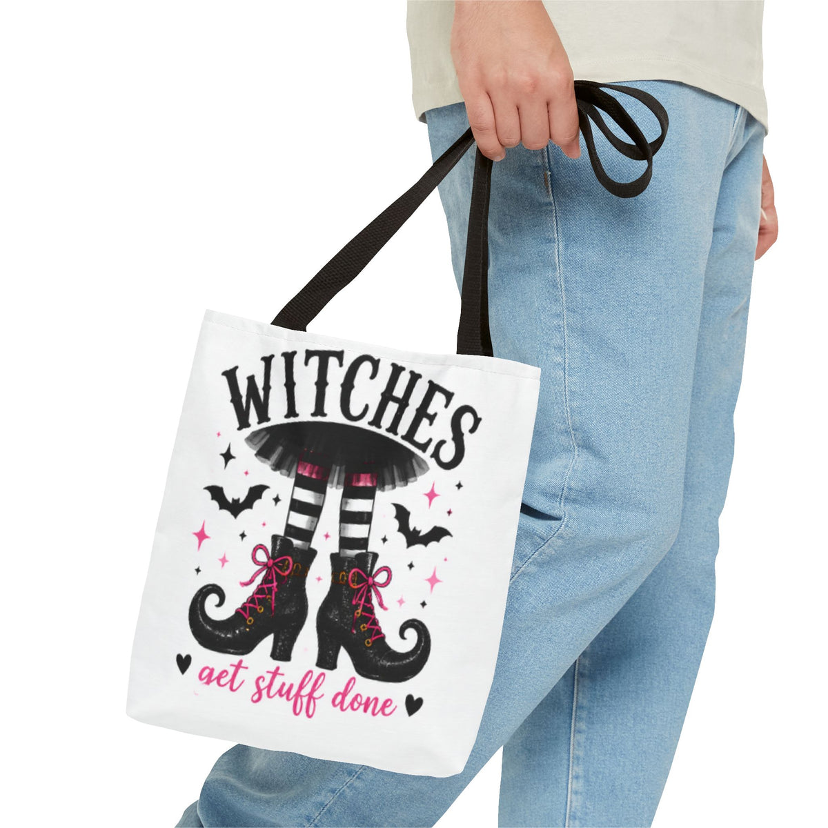 White tote bag with black handles, WITCHES graphic and witch boots with "get stuff done".