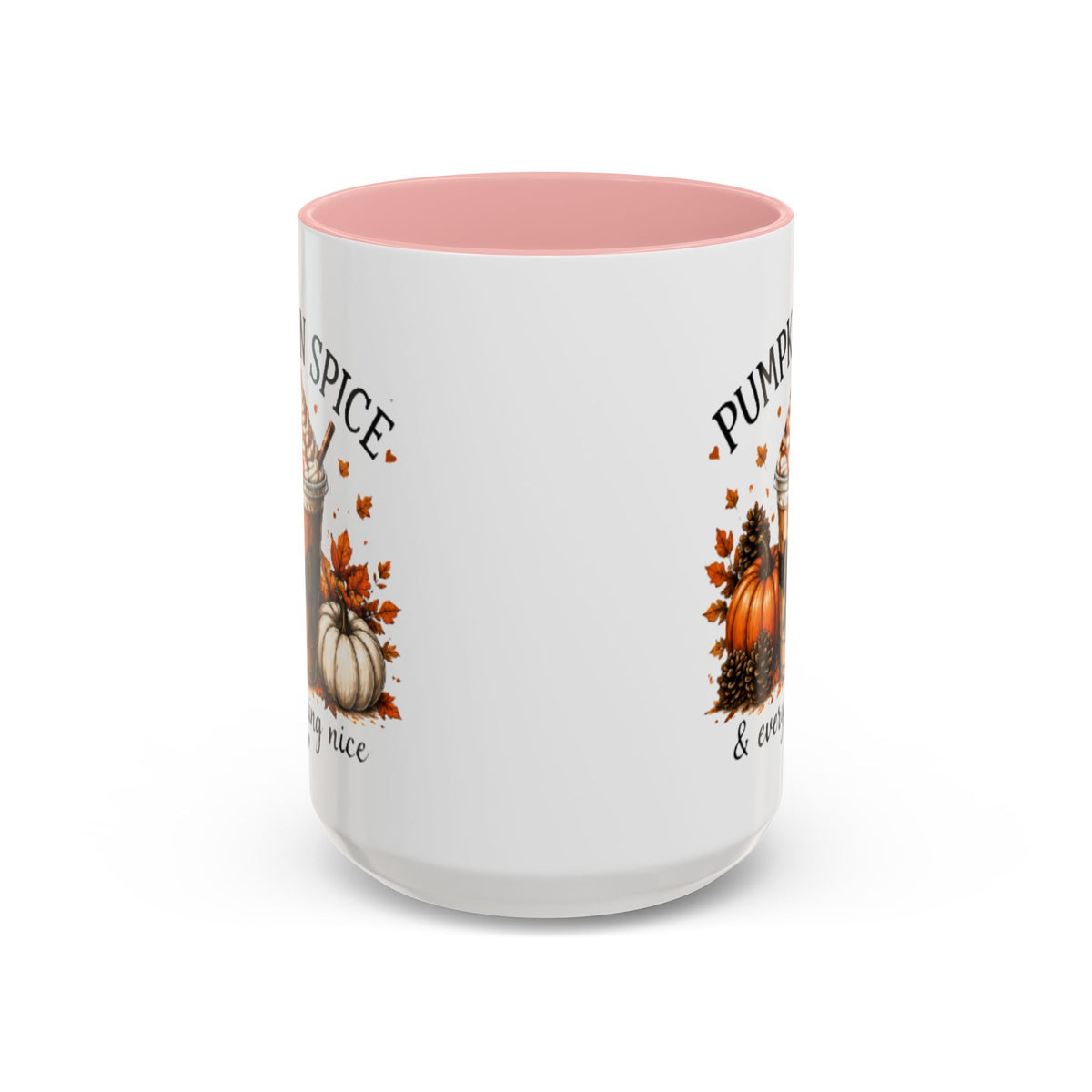 White pumpkin spice coffee mug with pink interior and fall pumpkin graphic with partial text