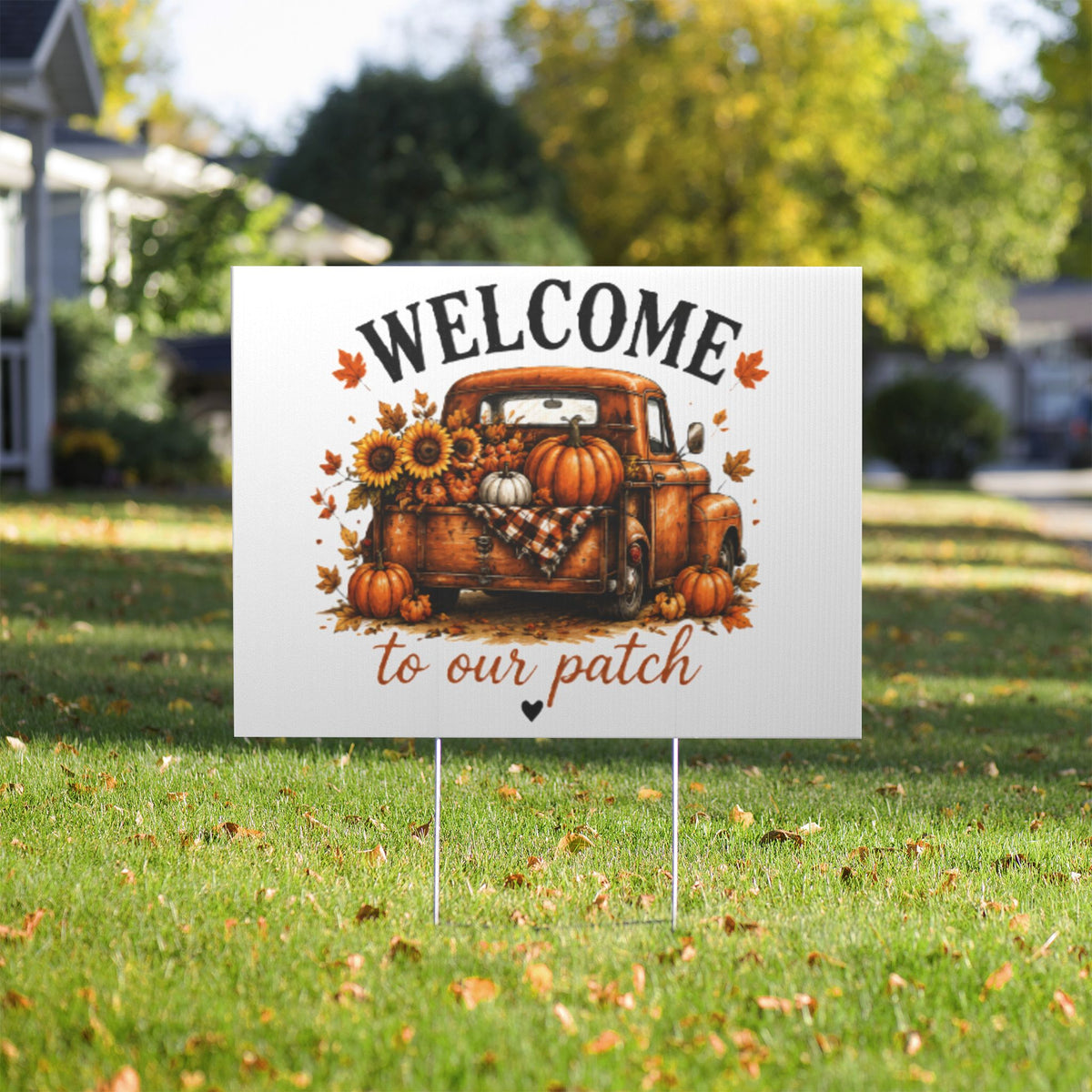 Fall yard sign with truck and pumpkins, 'WELCOME to our patch', on two metal stakes.