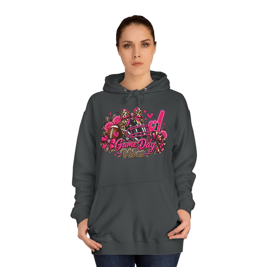 Game Day Cheer Hoodie — Pink Football Floral Design by Printify, modeled in a dark hoodie with a colorful pink football, floral, bow, and cheer graphic reading Game Day