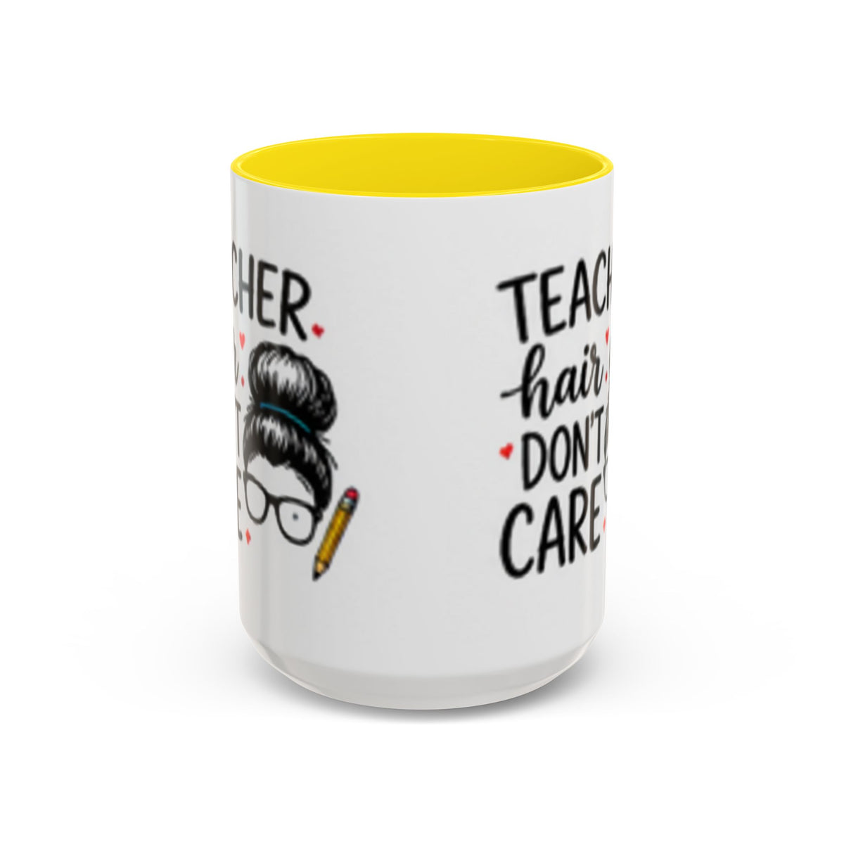 White coffee mug with yellow interior rim and “Teacher hair don’t care” text and hair graphic.