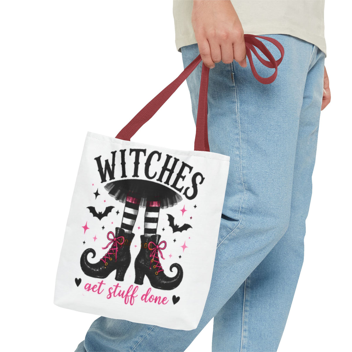 White tote bag with burgundy handles featuring witch boots graphic and 'get stuff done' text.
