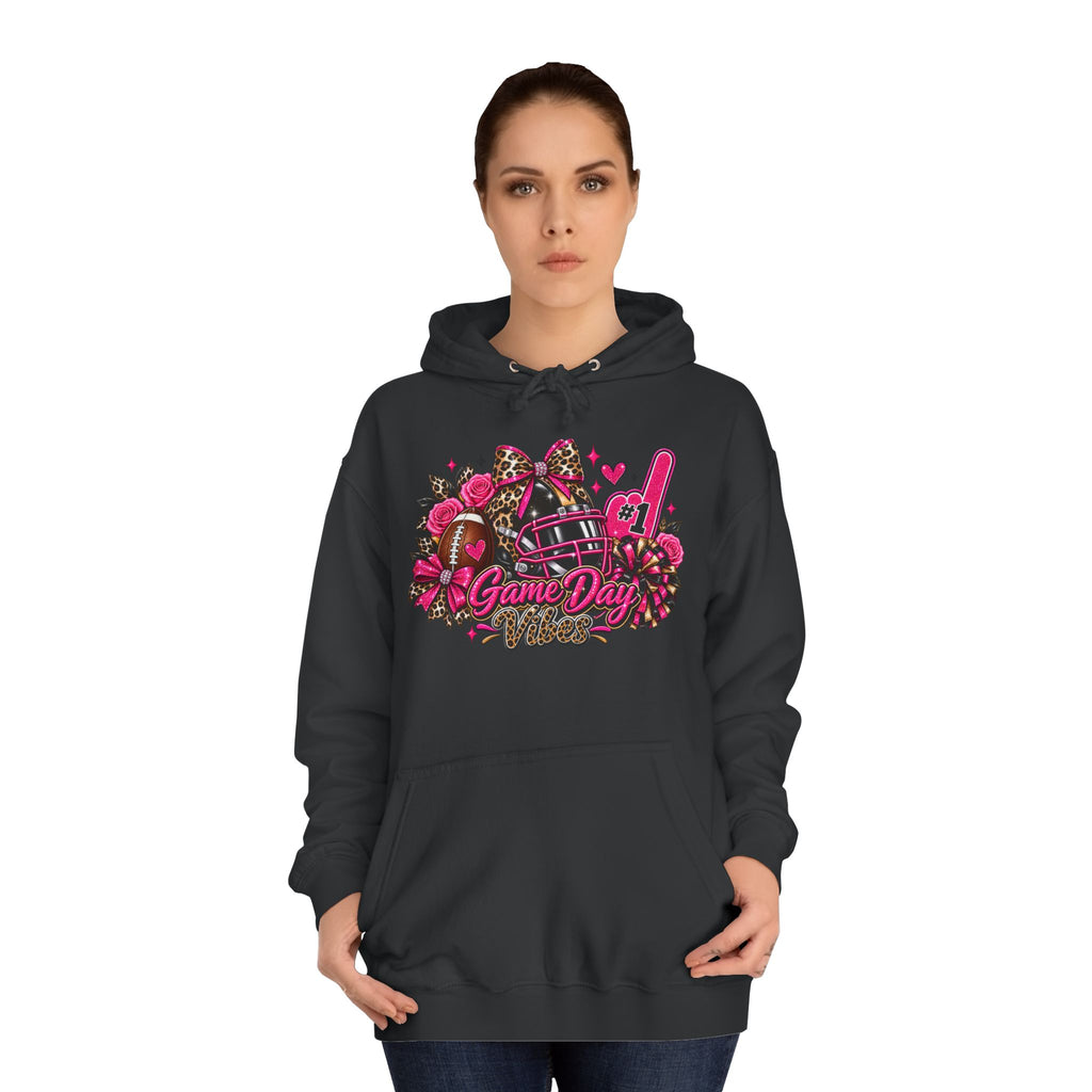 Game Day Cheer Hoodie — Pink Football Floral Design by Printify, black hoodie with pink football, bows, pom-poms, and Game Day graphic modeled on a woman