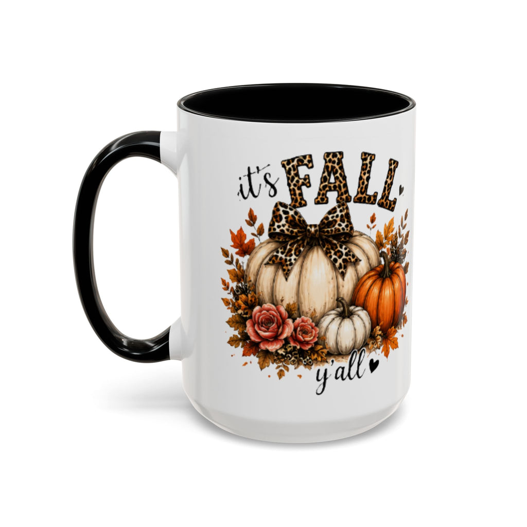Black and white autumn coffee mug with “it’s FALL” floral pumpkin graphic and bow