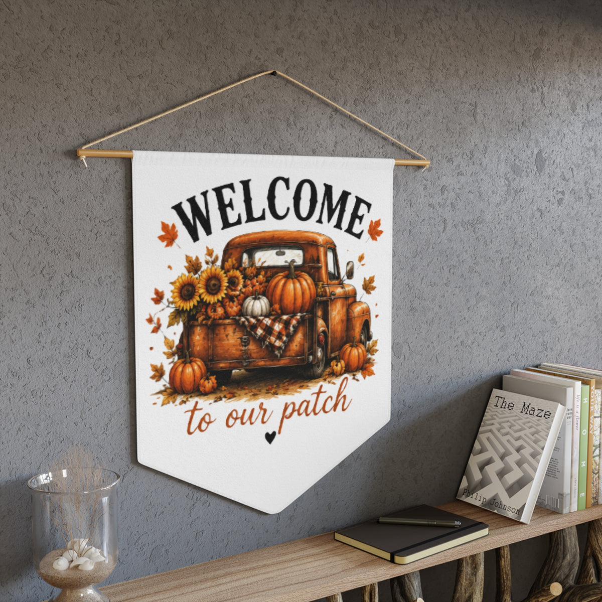 White welcome pennant banner with orange truck, pumpkins, sunflowers, and "to our patch"