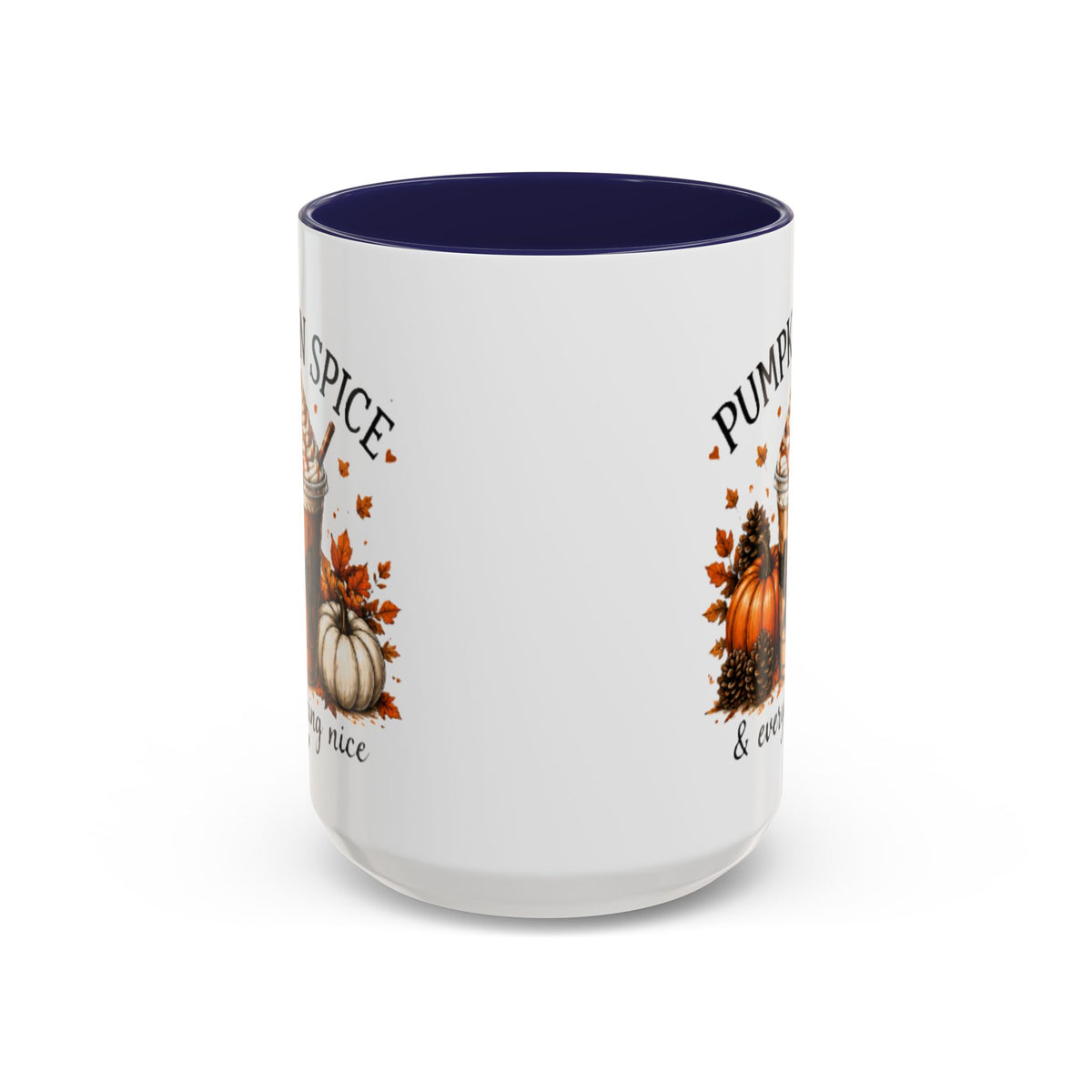 White pumpkin spice coffee mug with navy interior and fall pumpkin graphic with partial text