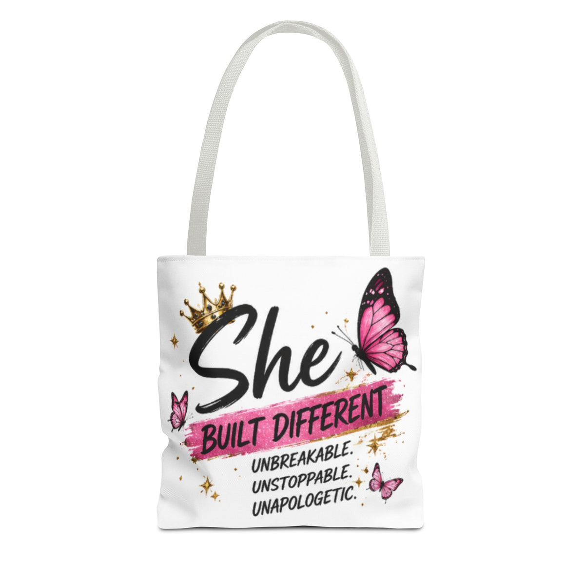 Light gray-strapped tote bag with 'She Built Different' lettering and pink butterfly graphic