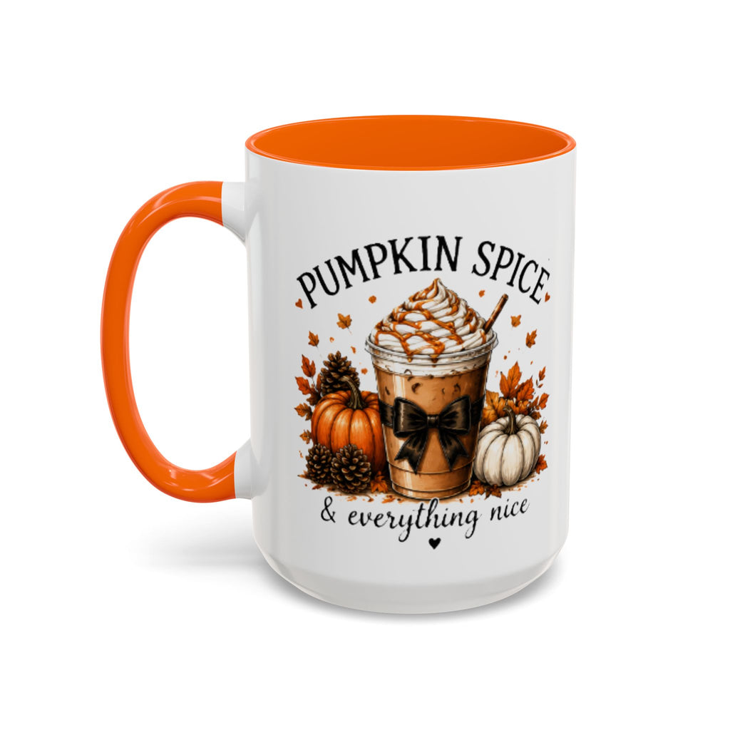 White coffee mug with orange rim and handle, “PUMPKIN SPICE & everything nice” design.