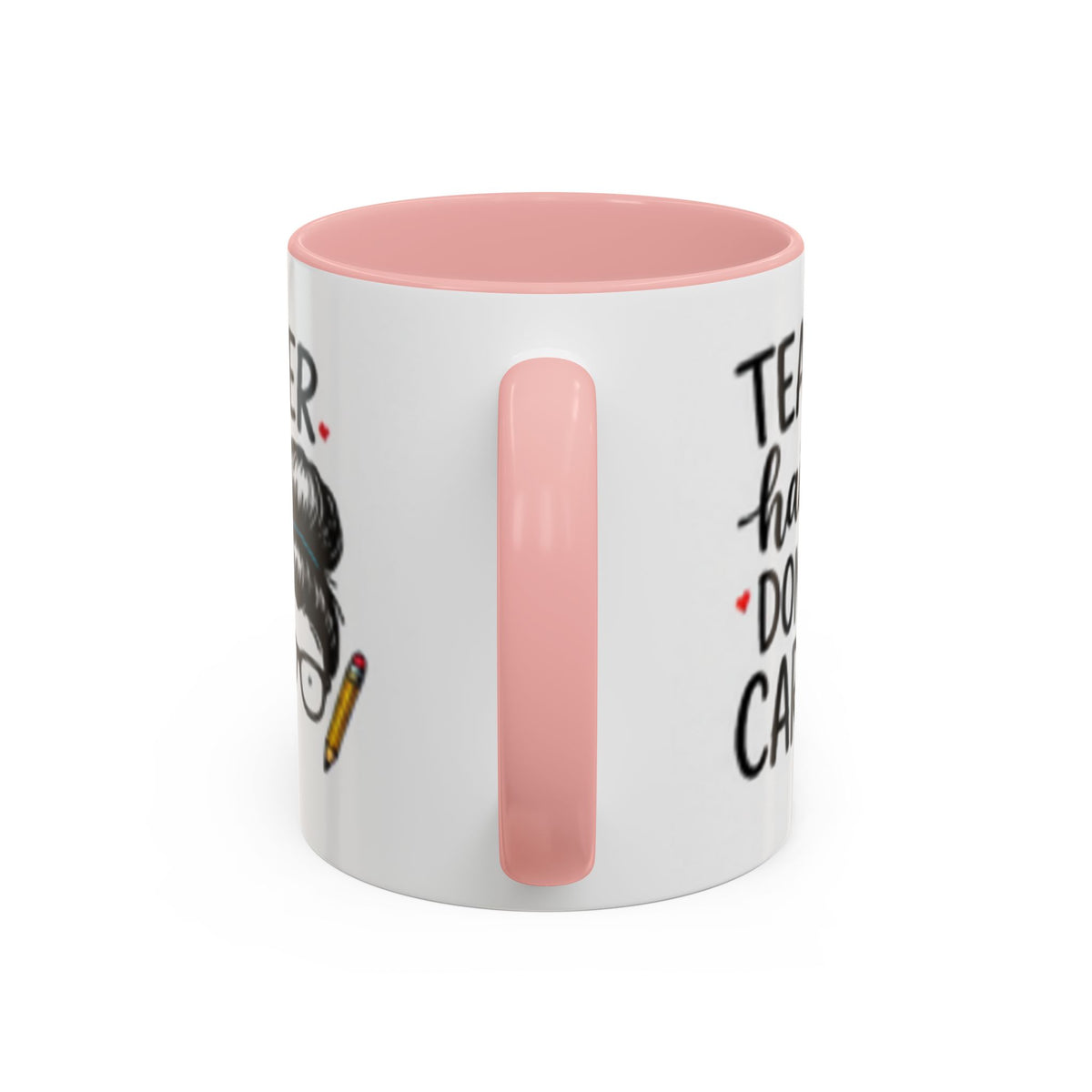 White coffee mug with pink rim and partial “Teacher hair don’t care” design