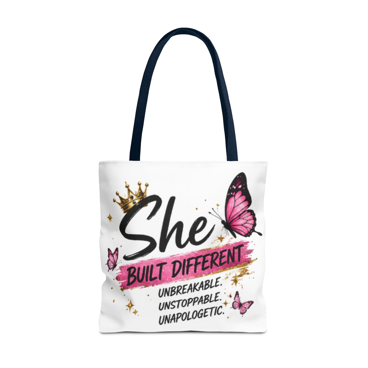 White tote bag with long navy handles, pink butterfly and crown “She Built Different” print