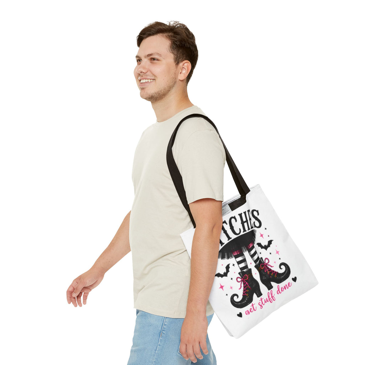 White tote bag with dark handles, WITCHES graphic and "get stuff done" text on front.