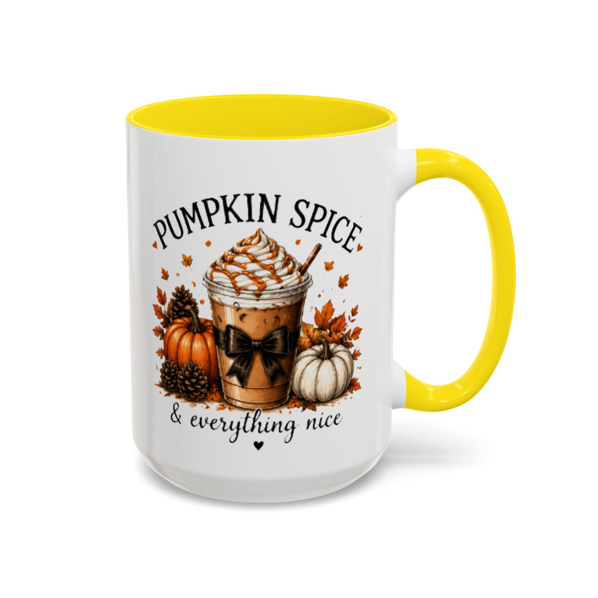 White coffee mug with yellow rim and handle, “PUMPKIN SPICE & everything nice” graphic.