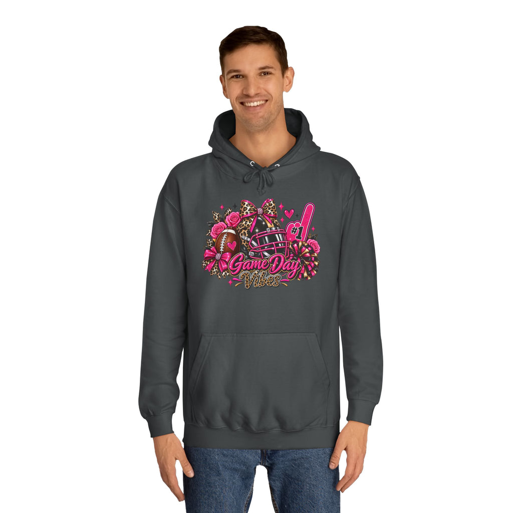 Game Day Cheer Hoodie — Pink Football Floral Design by Printify, dark gray pullover hoodie modeled by a man with a pink football and floral game day graphic