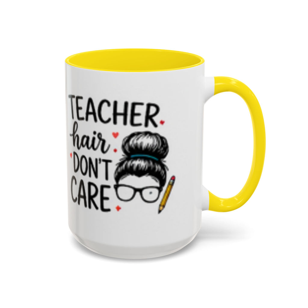 White coffee mug with yellow handle and interior, “TEACHER hair DON’T CARE” text and face.