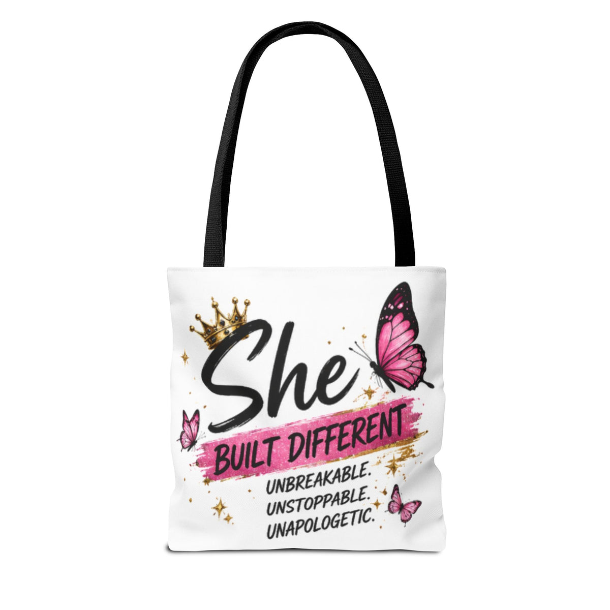 White tote bag with long black handles, crown and pink butterfly “She Built Different” graphic