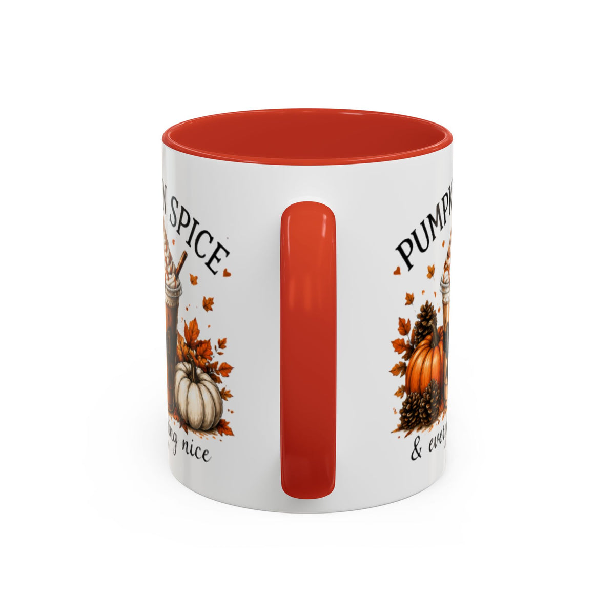 White coffee mug with orange interior; partial “Pumpkin Spice” text and pumpkin graphics