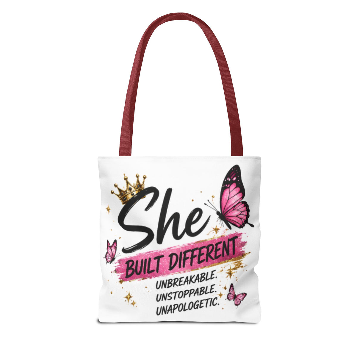 White tote bag with burgundy handles featuring “She Built Different” and pink butterflies